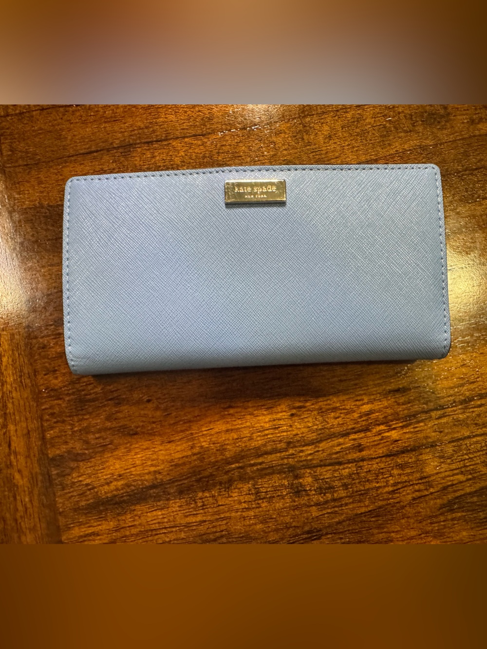 kate spade light blue saffiano continental wallet with gold plaque